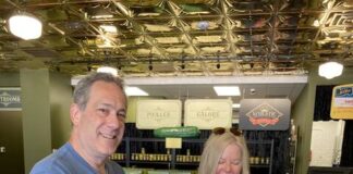 
			
				                                During their first visit to Mount Olive, Wilmington residents Reed Slatas, left, and Doran Rozen sample Mt. Olive Pickle Co. products in the company’s new downtown Pickle Parlor. Their verdict? ‘Delicious!’ and ‘Crisp and fresh!’ (Kathy Grant Westbrook|mountolivetribune.com)
 
			
		