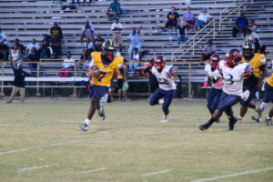 Saints outlast Cougars in overtime thriller, 32–26