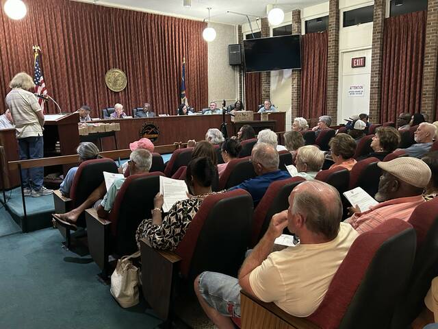 Packed house greets town board, seeks answers