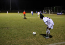 
			
				                                A Saints player takes a corner kick. (Karem Brown|mountolivetribune.com)
 
			
		