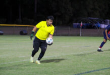 
			
				                                The Saints goalkeeper sending the ball back into play. (Kareem Brown|mountolivetribune.com)
 
			
		