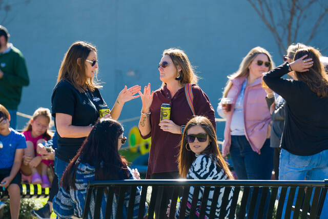 131873034_web1_Enjoying-the-day
Festival-goers enjoy the beer from R&R Brewing, the sunshine, and friends at Pickles, Pigs & Swigs last year. The Saturday, Nov. 8 event runs from 11 a.m. to 4 p.m. in Downtown Mount Olive.