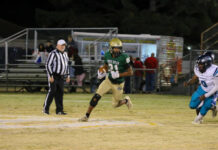 
			
				                                North Duplin’s Carell Phillips explodes downfield with a huge run slicing through the Seahawks’ defense. (Kareem Brown|mountolivetribune.com)
 
			
		