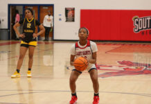 
			
				                                Southern Wayne’s No. 20, Mylasia Bradshaw, prepares for a free throw, where she went 1-for-1 at the line. (Kareem Brown|mountolivetribune.com)
 
			
		