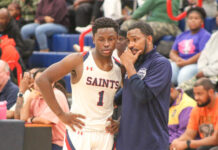 
			
				                                Southern Wayne’s Coach Brian West coaching up his player on a quick timeout. (Kareem Brown|mountolivetribune.com)
 
			
		