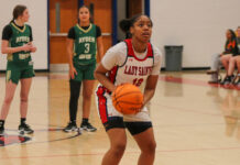Ayden Grifton Chargers overpower Southern Wayne Saints in hard-fought battle, 52–42
Southern Waynes No. 12 Kymora Stokes lining up for a free throw after making a tough layup and a foul. (Kareem Brown|mountolivetribune.com)