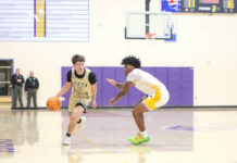
			
				                                North Duplins No. 10 Lucas Dail drives the ball up the court against the Eagles defenders looking for an opening.
 
			
		