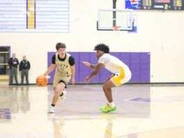Eagles soar past Rebels with relentless defense
North Duplins No. 10 Lucas Dail drives the ball up the court against the Eagles defenders looking for an opening.