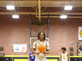 James Kenan controls the game in win over Midway
James Kenans No. 2 Zamarion Smith, steps to the free-throw line and sinks both shots for two points.