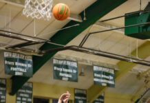 
			
				                                North Duplins No. 24 Noah Price attempts a jump shot against Union Spartans defenders at the start of the first quarter. (Kareem Brown|mountolivetribune.com)
 
			
		