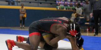 
			
				                                Southern Wayne Saints Jordan Valentine clashes with the Goldsboro Cougars in a relentless wrestling war, every move powered by strength, and grit. Saints take this one.
 
			
		