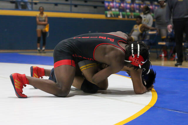 Southern Wayne Saints Jordan Valentine clashes with the Goldsboro Cougars in a relentless wrestling war, every move powered by strength, and grit. Saints take this one.
