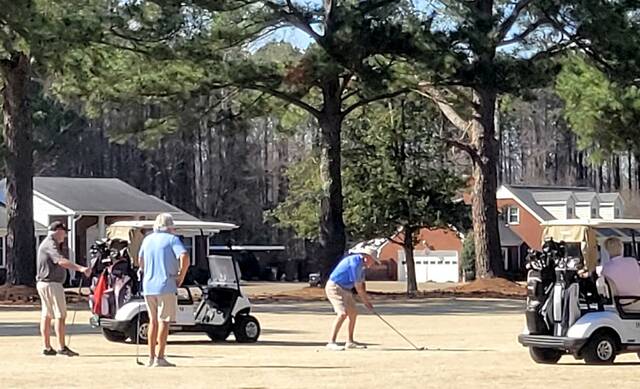 Golfers participating in Rotary of Mount Olives 2026 Cabin Fever Golf Tournament.