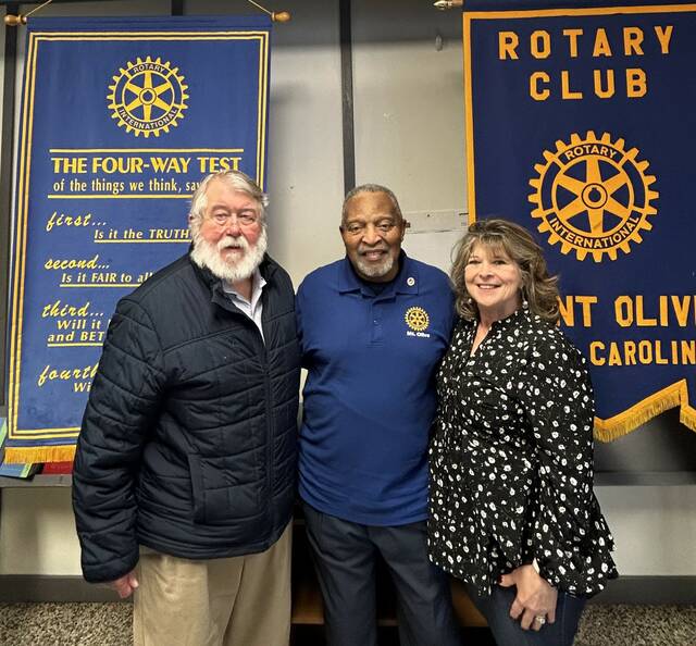 Rotarians Barton Baldwin, Al Southerland and Linda Grider.