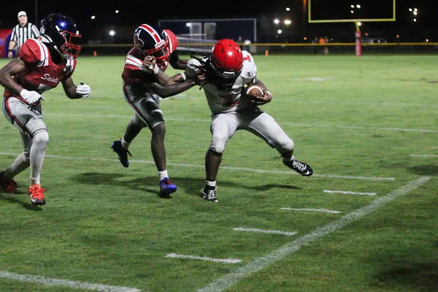 Southern Waynes defense stops Spartans running back No. 1 Tobias Cromartie on fourth down.