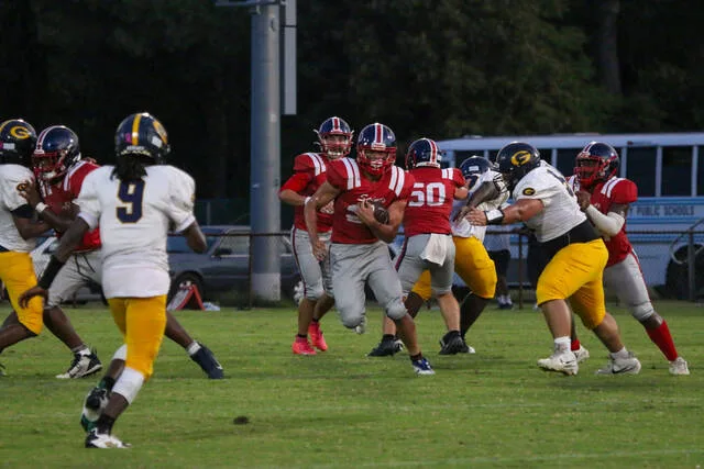 Saints soar past Goldsboro in dominant county rivalry victory
